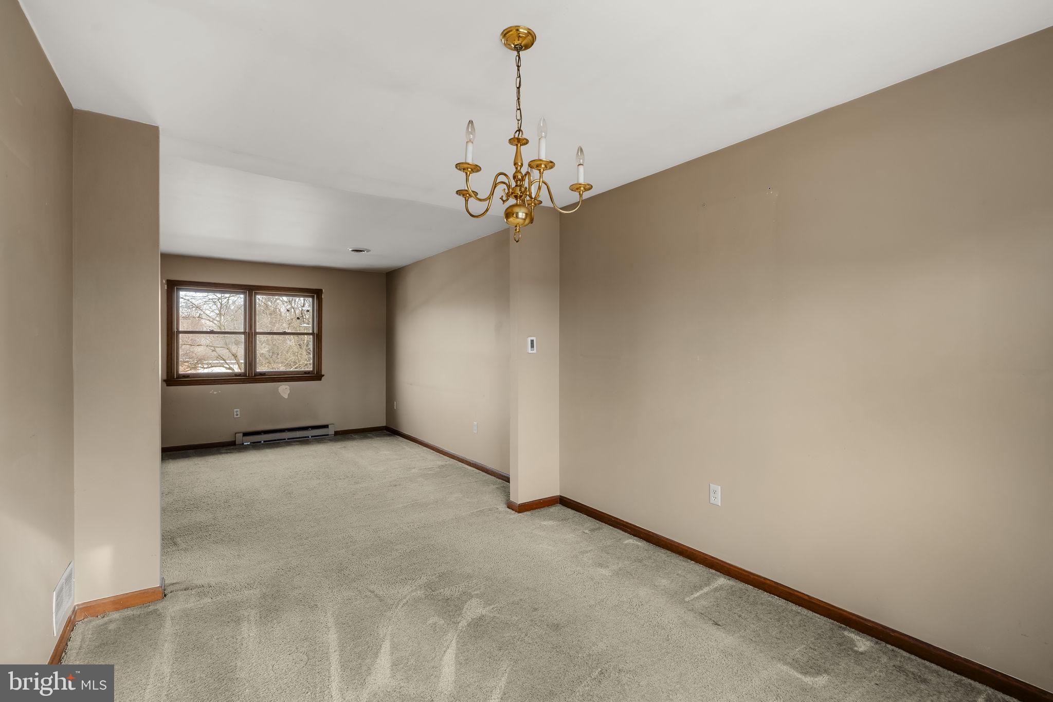 30 Buttonwood Drive Lititz, PA 17543 - Photo 16 of 43 wooden floor in an empty room with a window