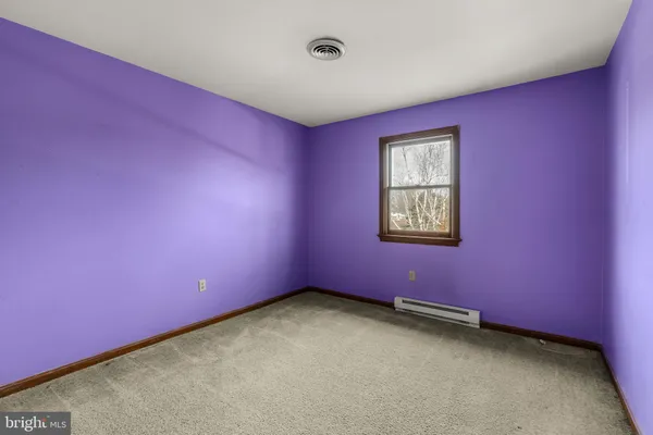a view of empty room with window