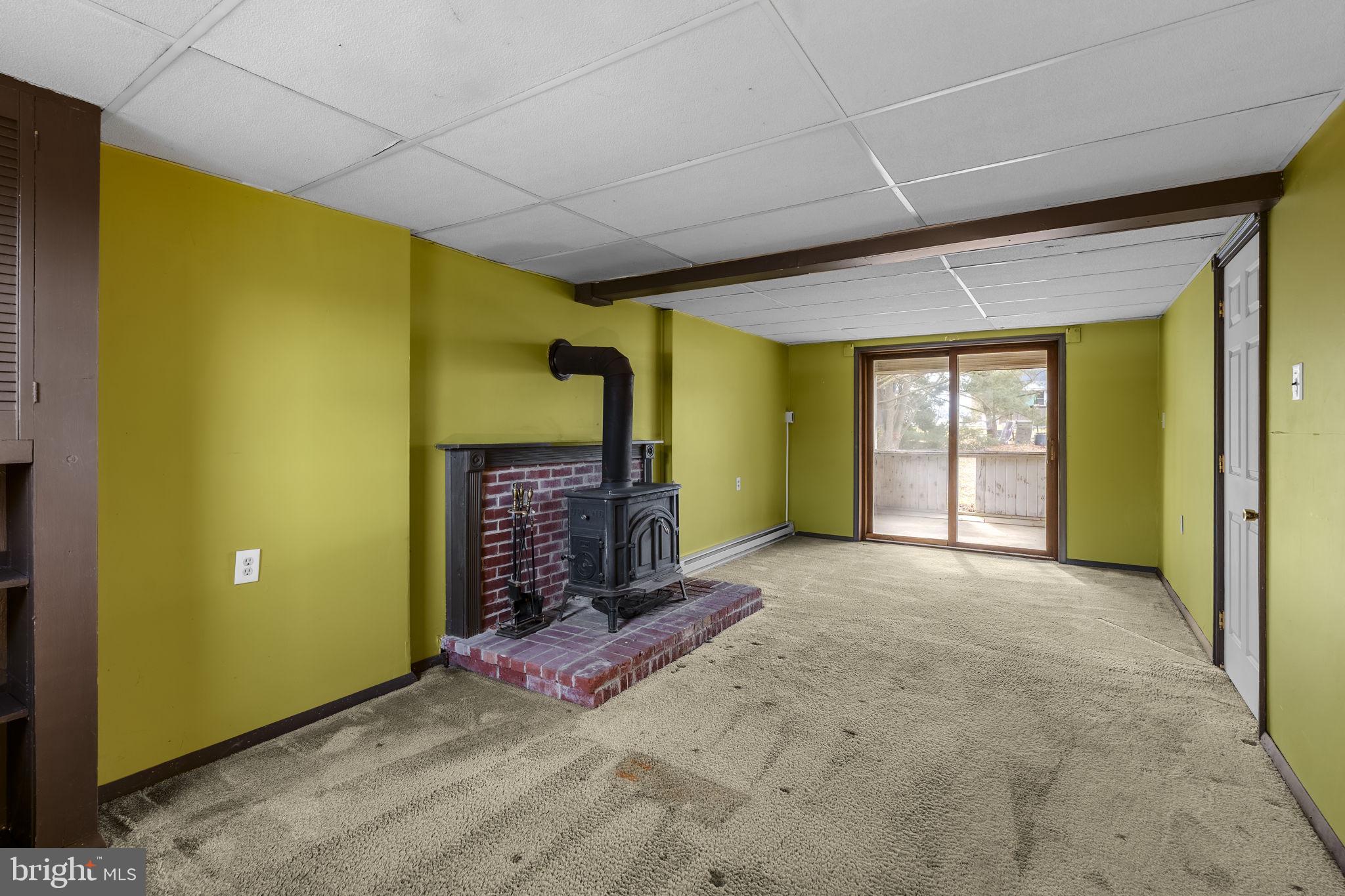 30 Buttonwood Drive Lititz, PA 17543 - Photo 31 of 43 a view of an empty room with a fireplace and a window