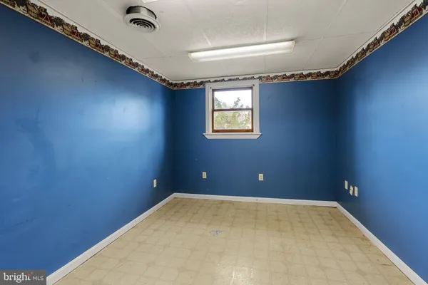 a view of a room with an empty space