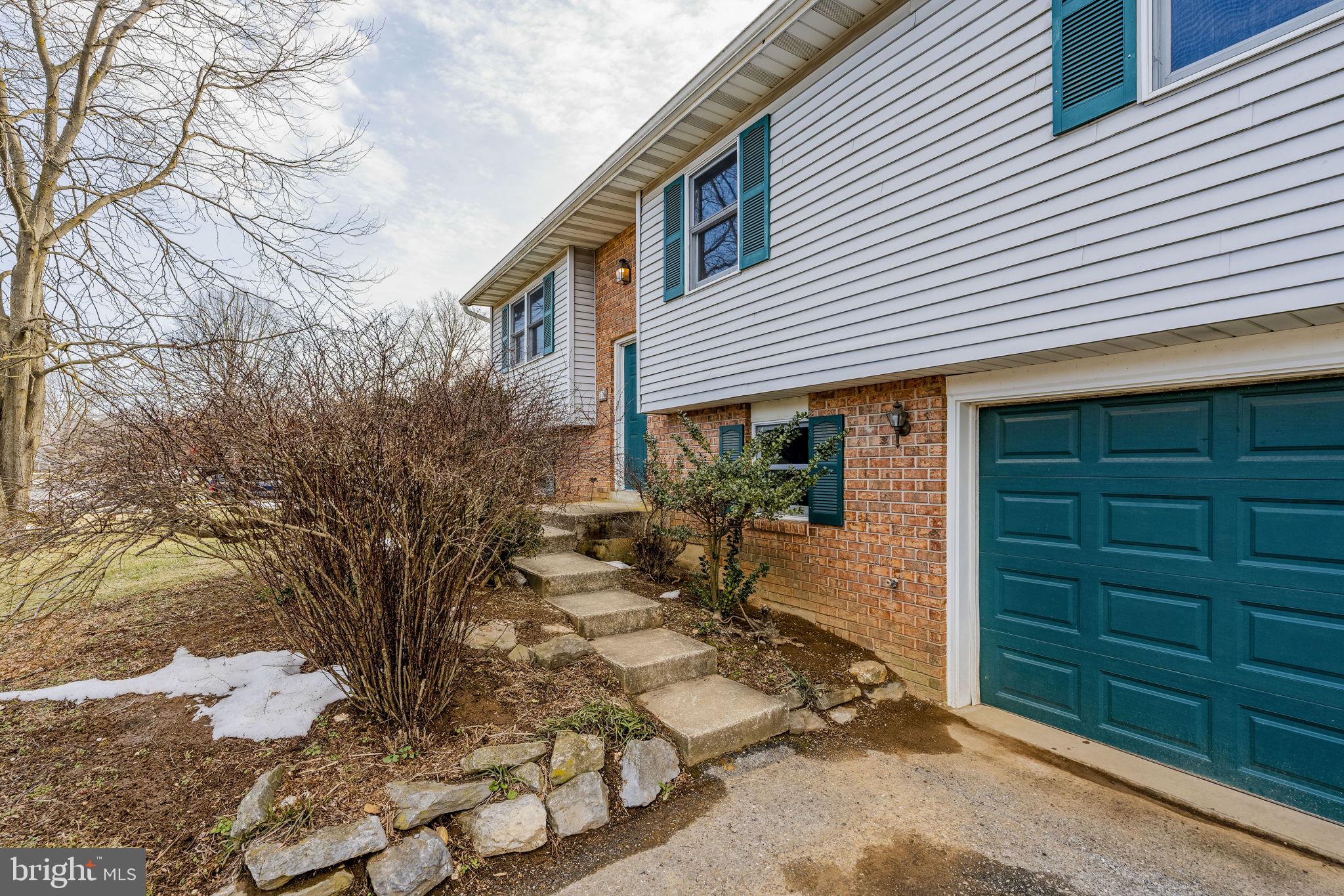 30 Buttonwood Drive Lititz, PA 17543 - Photo 4 of 43 a view of house with backyard and sitting area
