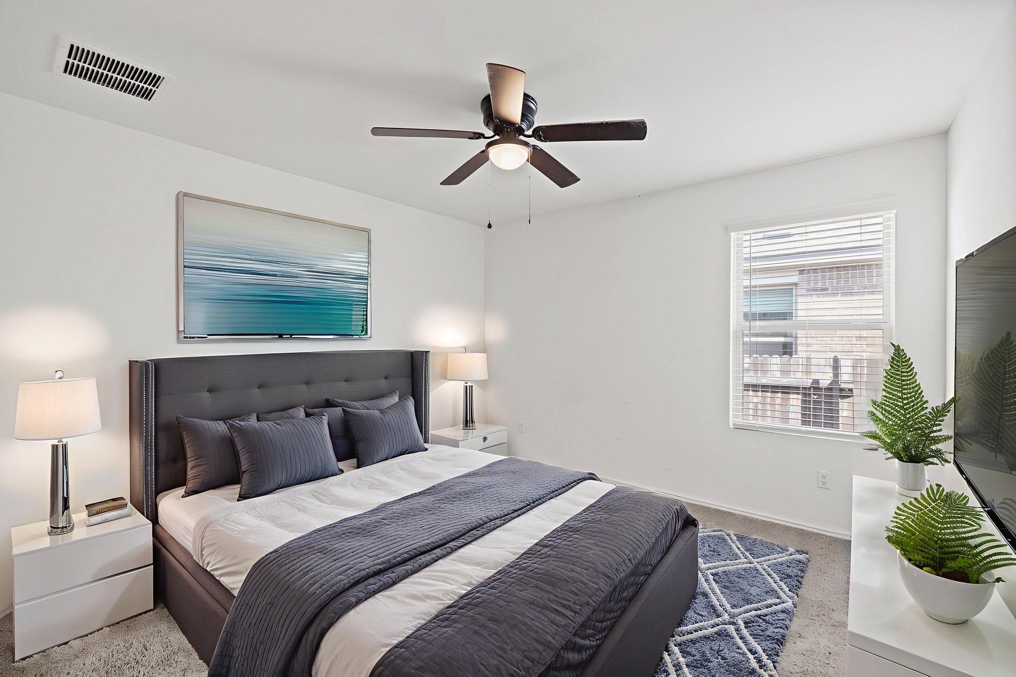 127 George Kimble Cove Bastrop, TX 78602 - Photo 23 of 40 Carpeted bedroom featuring a ceiling fan and baseboards