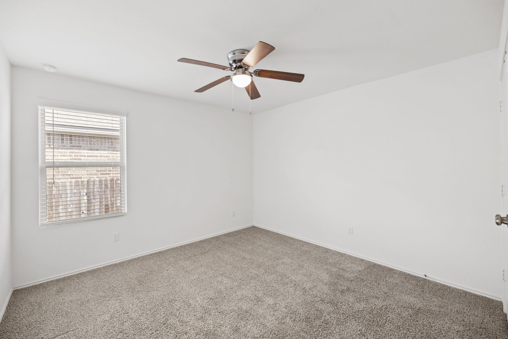 127 George Kimble Cove Bastrop, TX 78602 - Photo 26 of 40 Spare room with carpet flooring and a ceiling fan