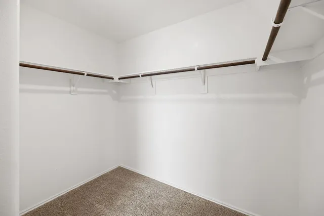 a view of a room with racks on the wall