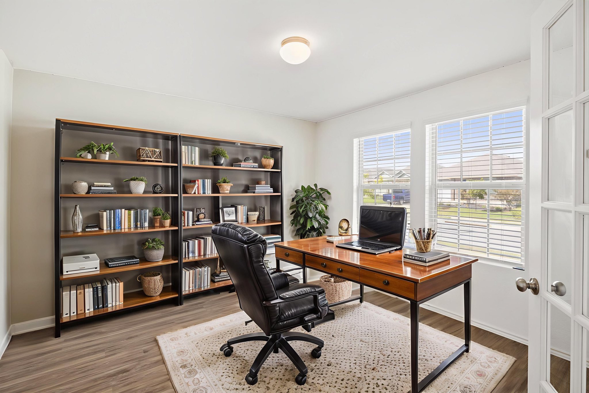 127 George Kimble Cove Bastrop, TX 78602 - Photo 8 of 40 Home office featuring wood finished floors and french doors