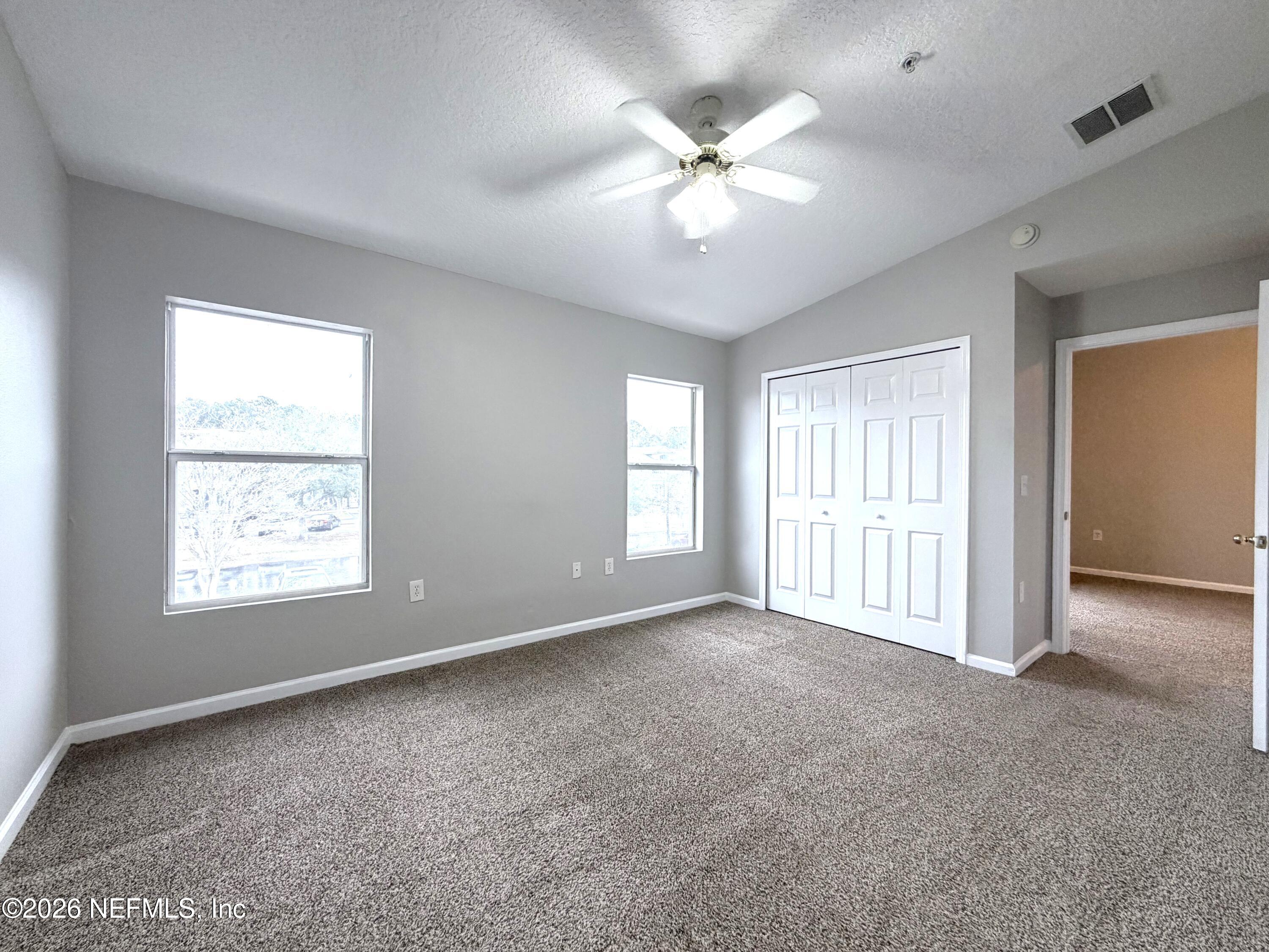 7920 Merrill Road, Unit 1811 Jacksonville, FL 32277 - Photo 6 of 11 Primary bedroom