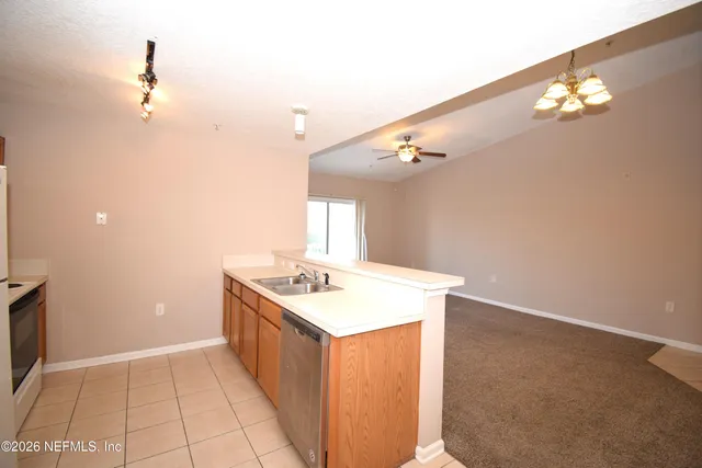 a bathroom with a sink a vanity and a mirror