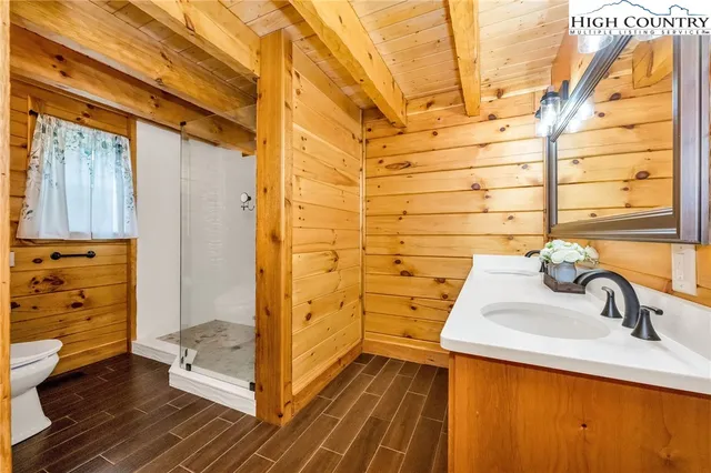 a bathroom with a sink and a shower