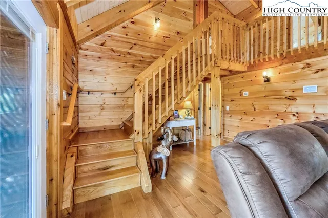 a view of entryway with wooden floor