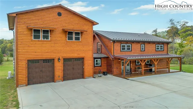 a front view of a house with a garage