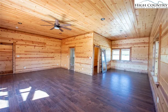 a view of room with wooden floor