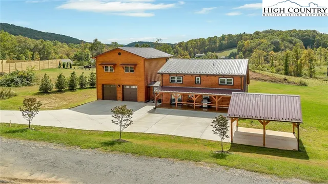 a view of a chairs in front of house