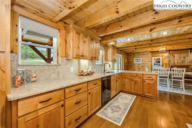 a large kitchen with a large window