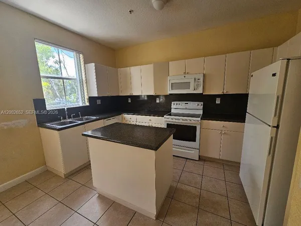 $255,000 | 1914 Shoma Drive, Unit 1914, Royal Palm Beach, FL 33414