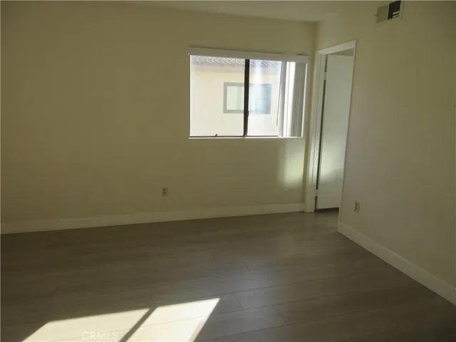 an empty room with a bench