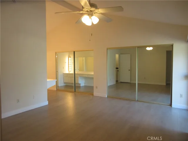 a view of a room with a large window