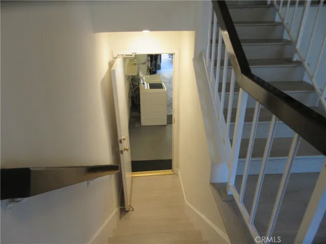 a view of a livingroom with storage & utility room