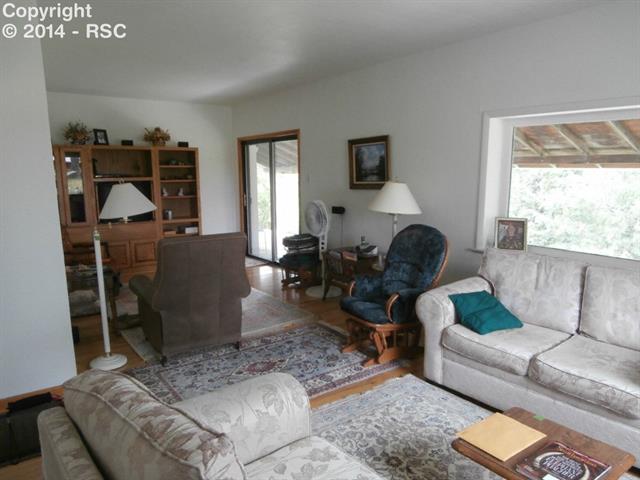 15720 Berridge Road Ramah, CO 80832 - Photo 2 of 19 Living room with walkout