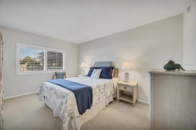 a sign that is on a brick wall