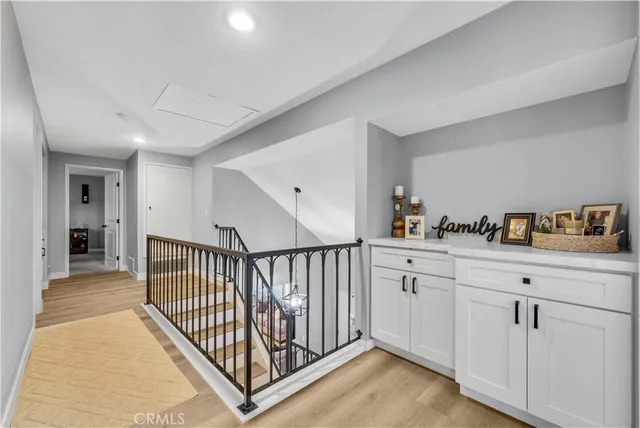 a view of a hallway with closet area