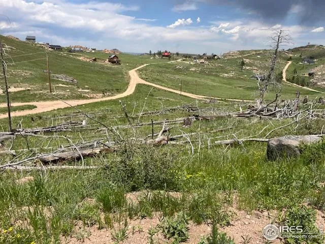 a view of a lake with a big yard