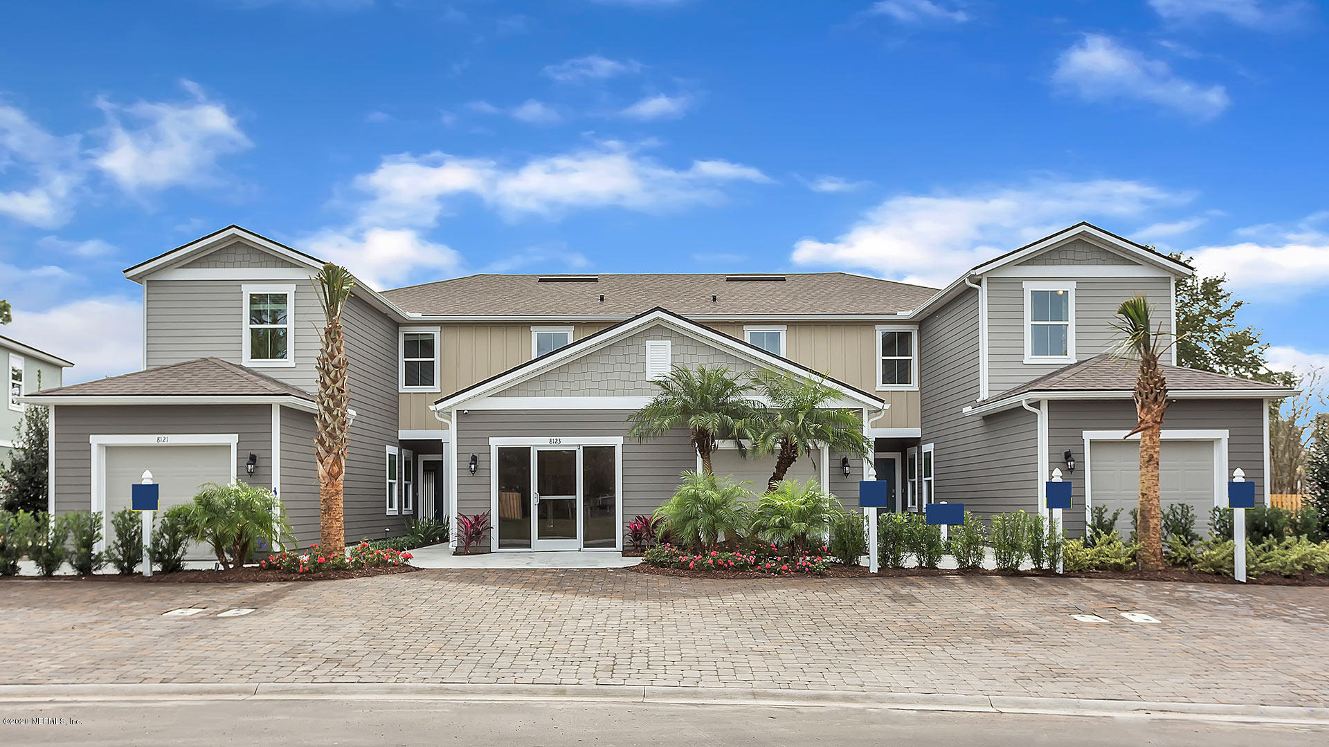 front view of a house with a small yard