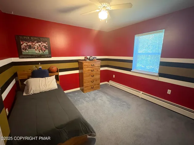 a bedroom with a bed and a closet