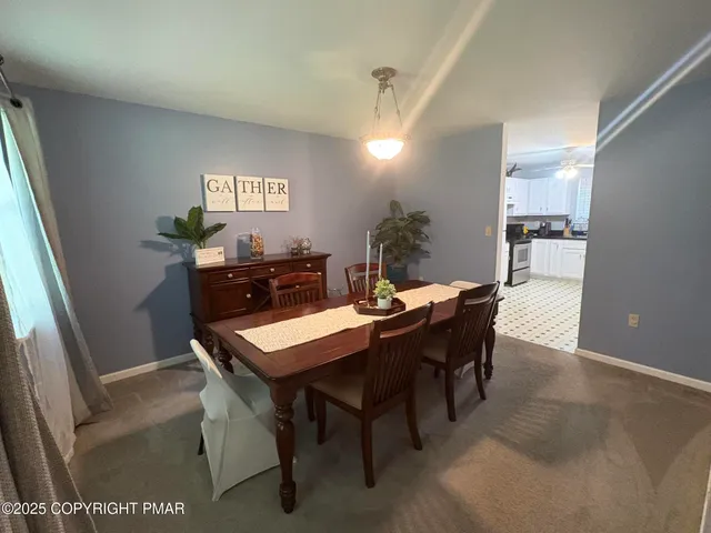 a view of a workspace with furniture