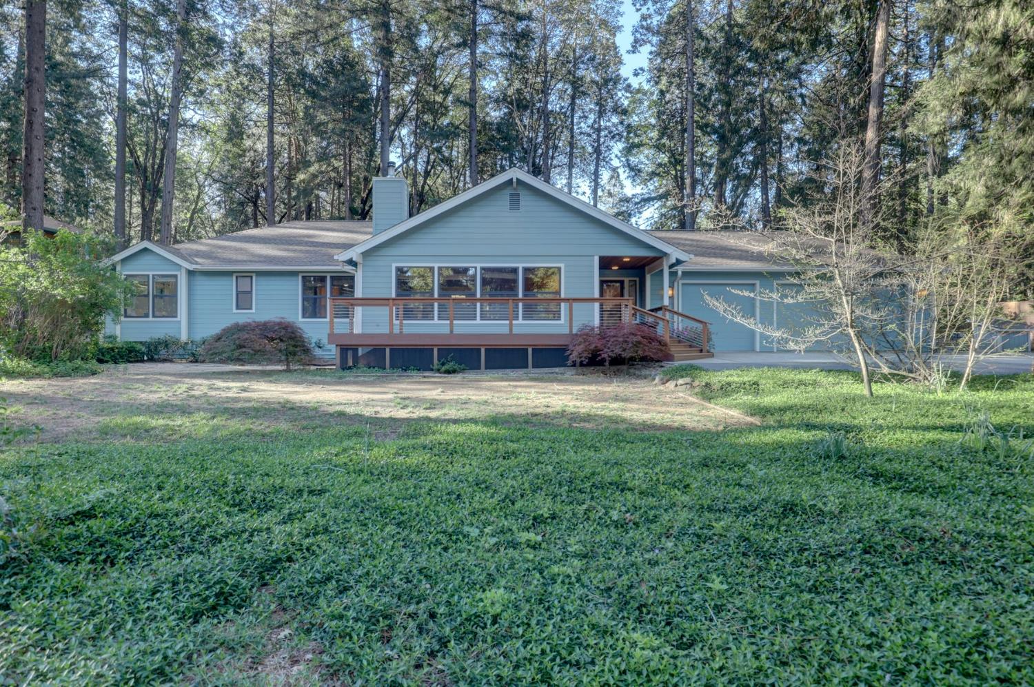 a house view with a garden space
