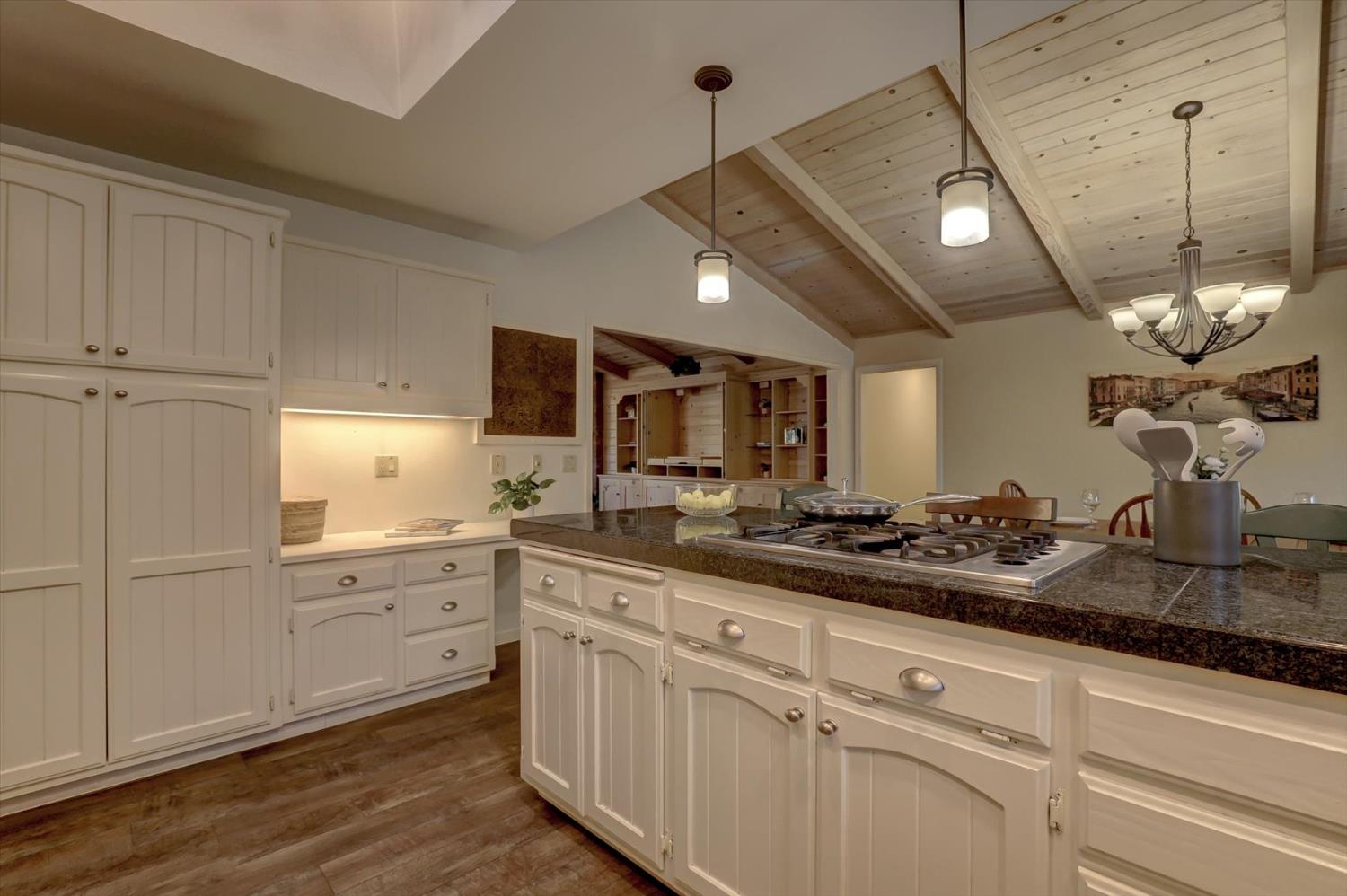 12523 Banner Lava Cap Road Nevada City, CA 95959 - Photo 13 of 57 a kitchen with a sink stainless steel appliances and cabinets