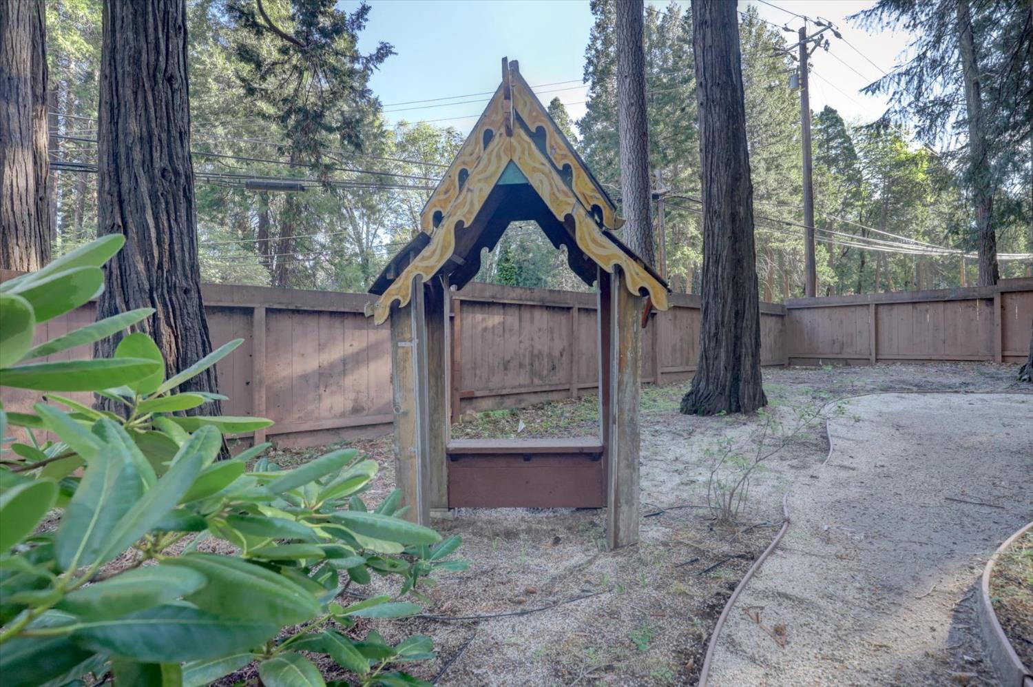 12523 Banner Lava Cap Road Nevada City, CA 95959 - Photo 40 of 57 a house view with a garden space
