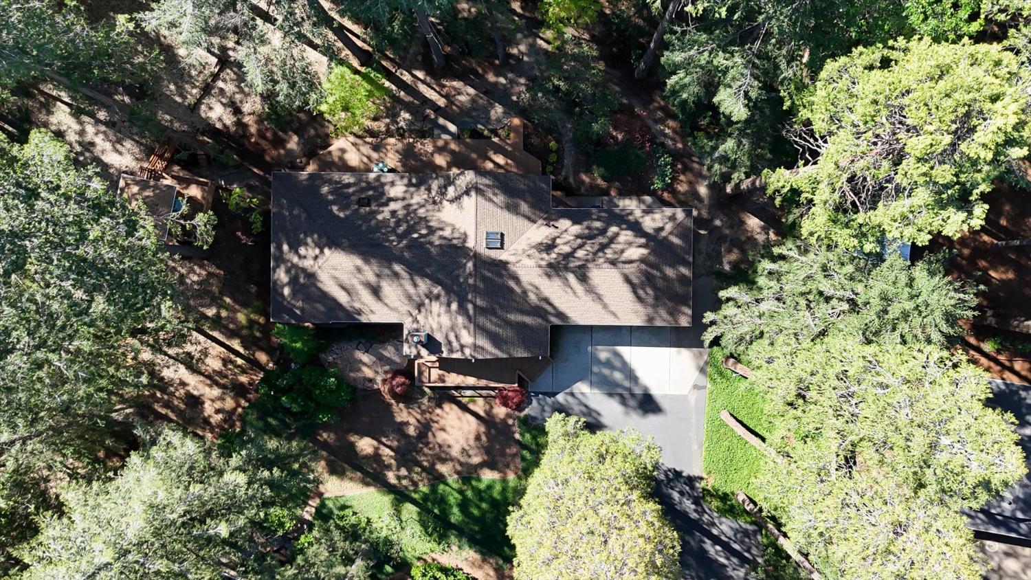 12523 Banner Lava Cap Road Nevada City, CA 95959 - Photo 45 of 57 a backyard of a house with lots of green space