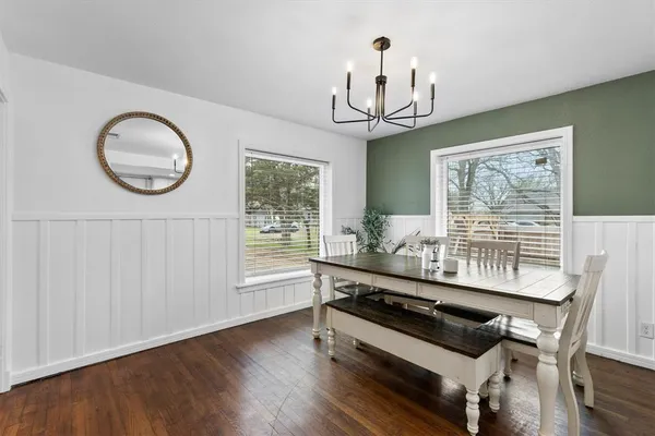 a view of dining room and wooden floor