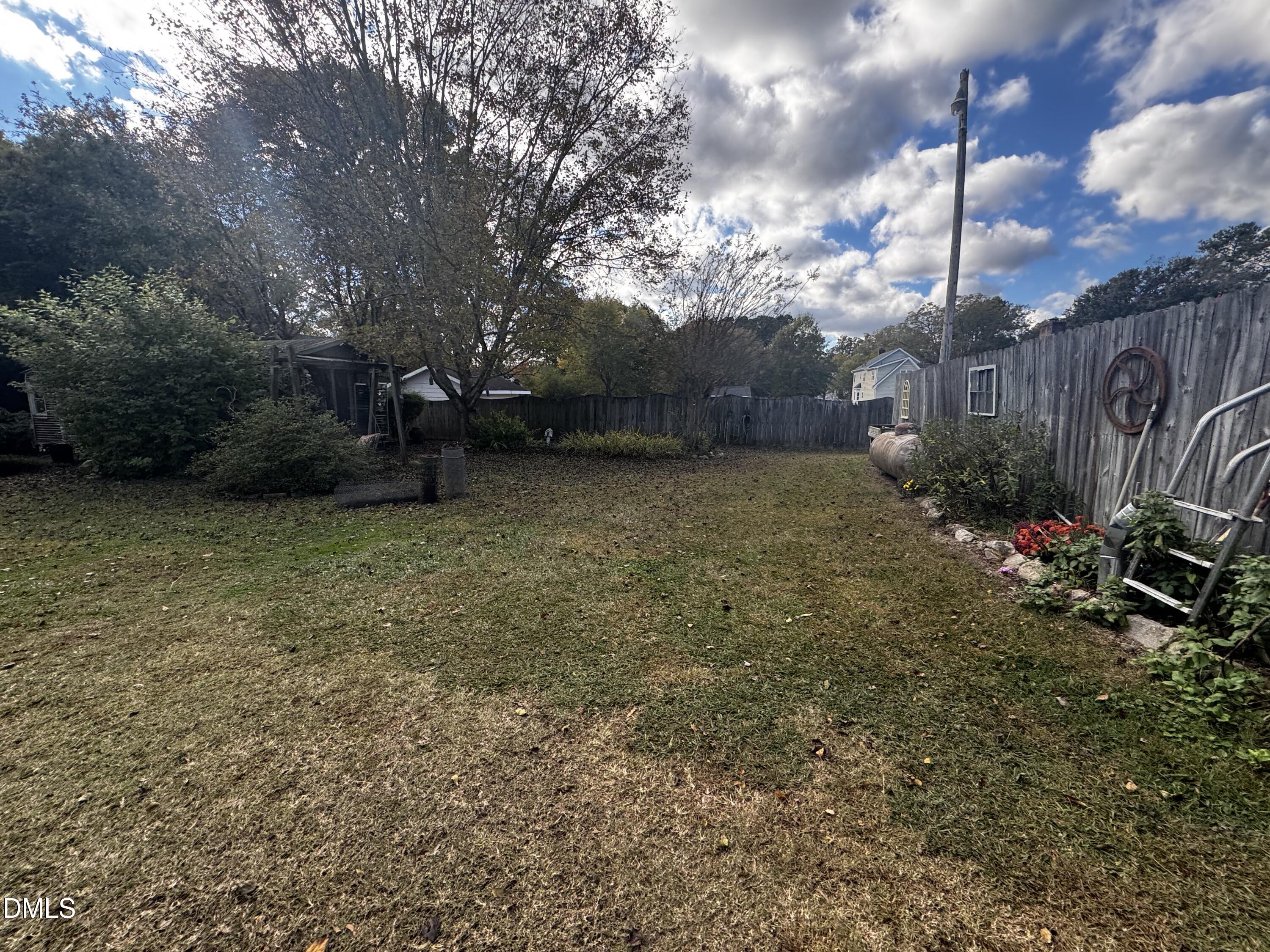 4229 Old Faison Road Knightdale, NC 27545 - Photo 12 of 16 a view of a backyard with pathway