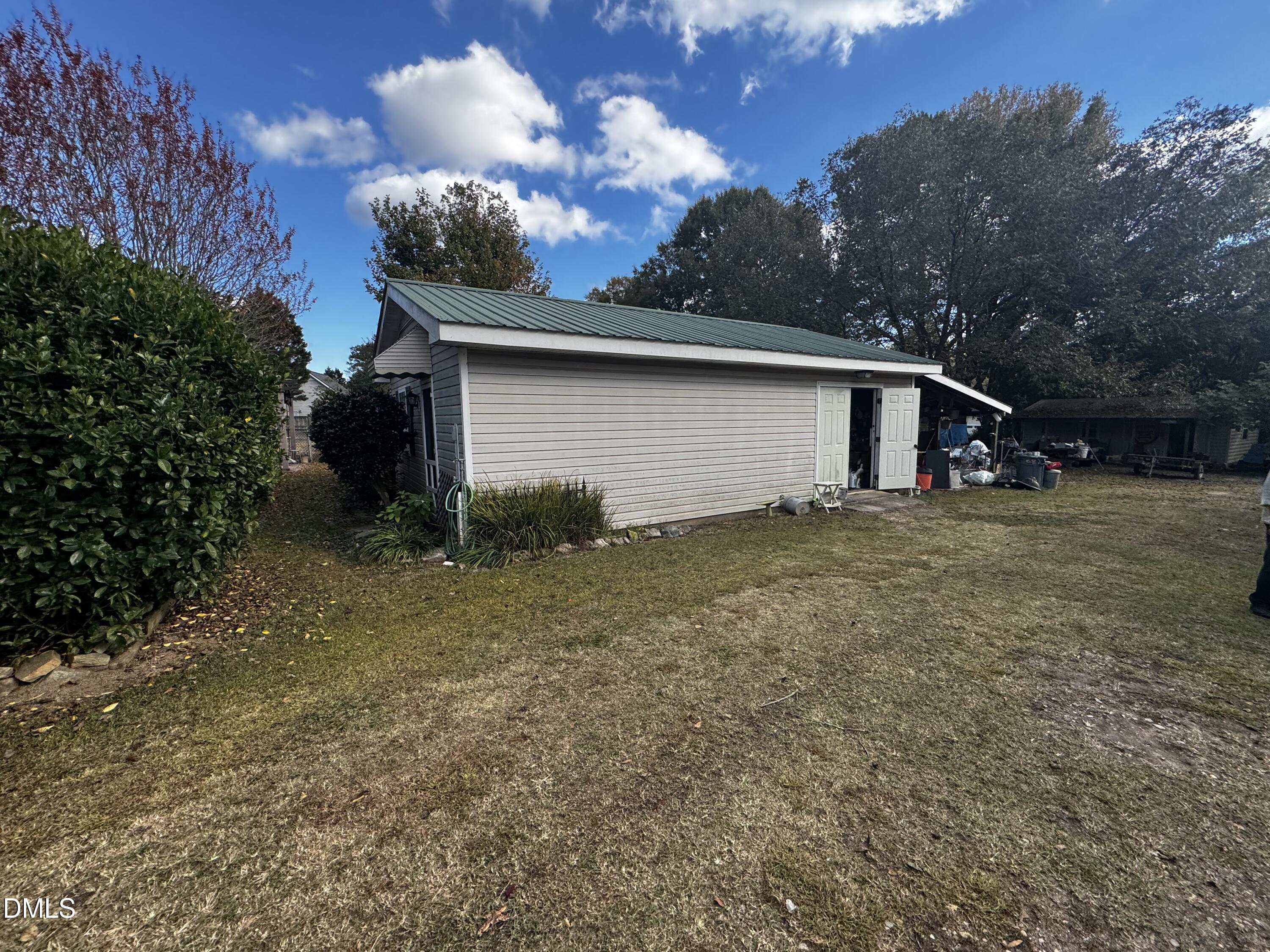 4229 Old Faison Road Knightdale, NC 27545 - Photo 13 of 16 a view of a house with a yard