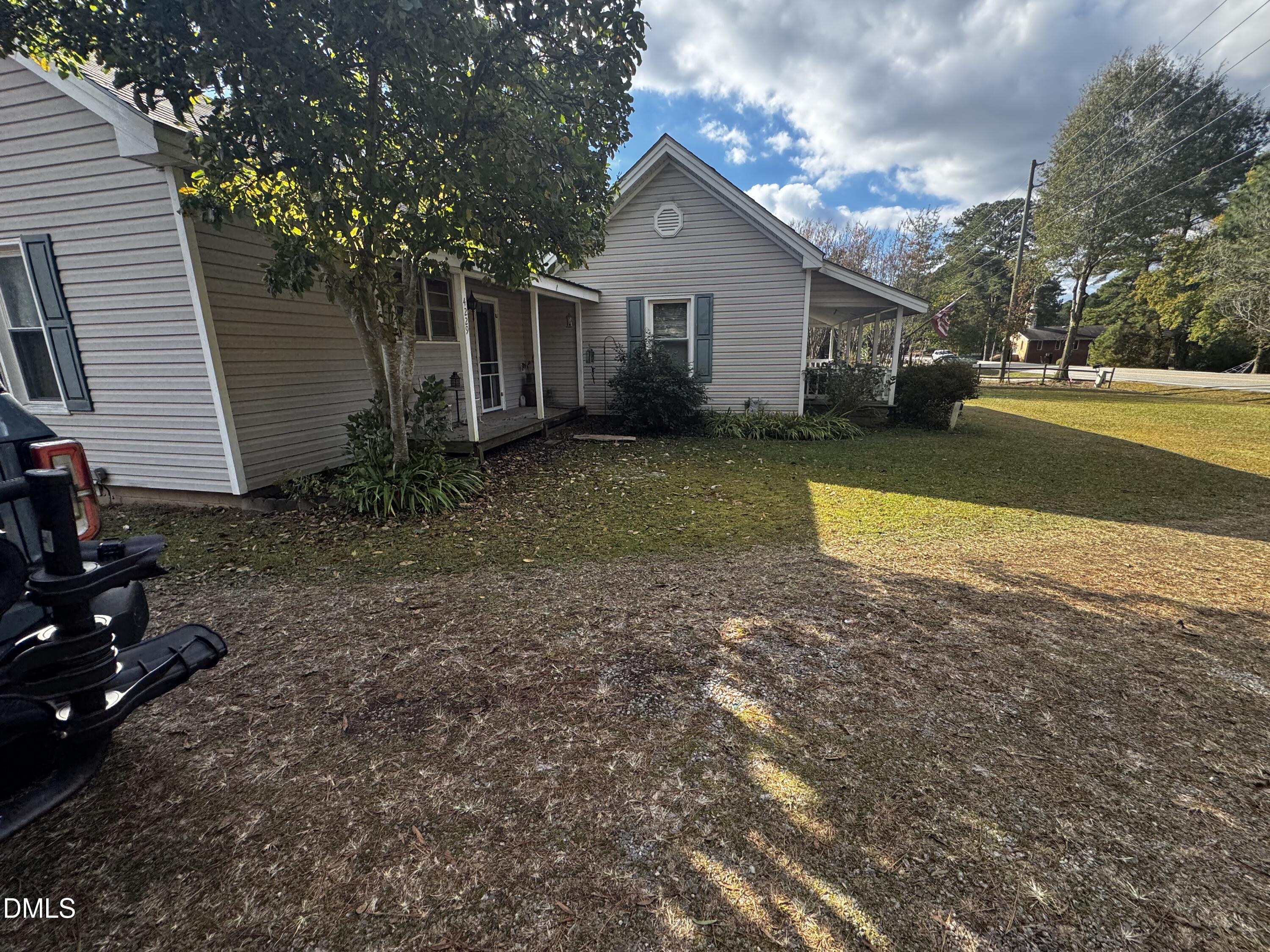 4229 Old Faison Road Knightdale, NC 27545 - Photo 15 of 16 a view of a house with swimming pool