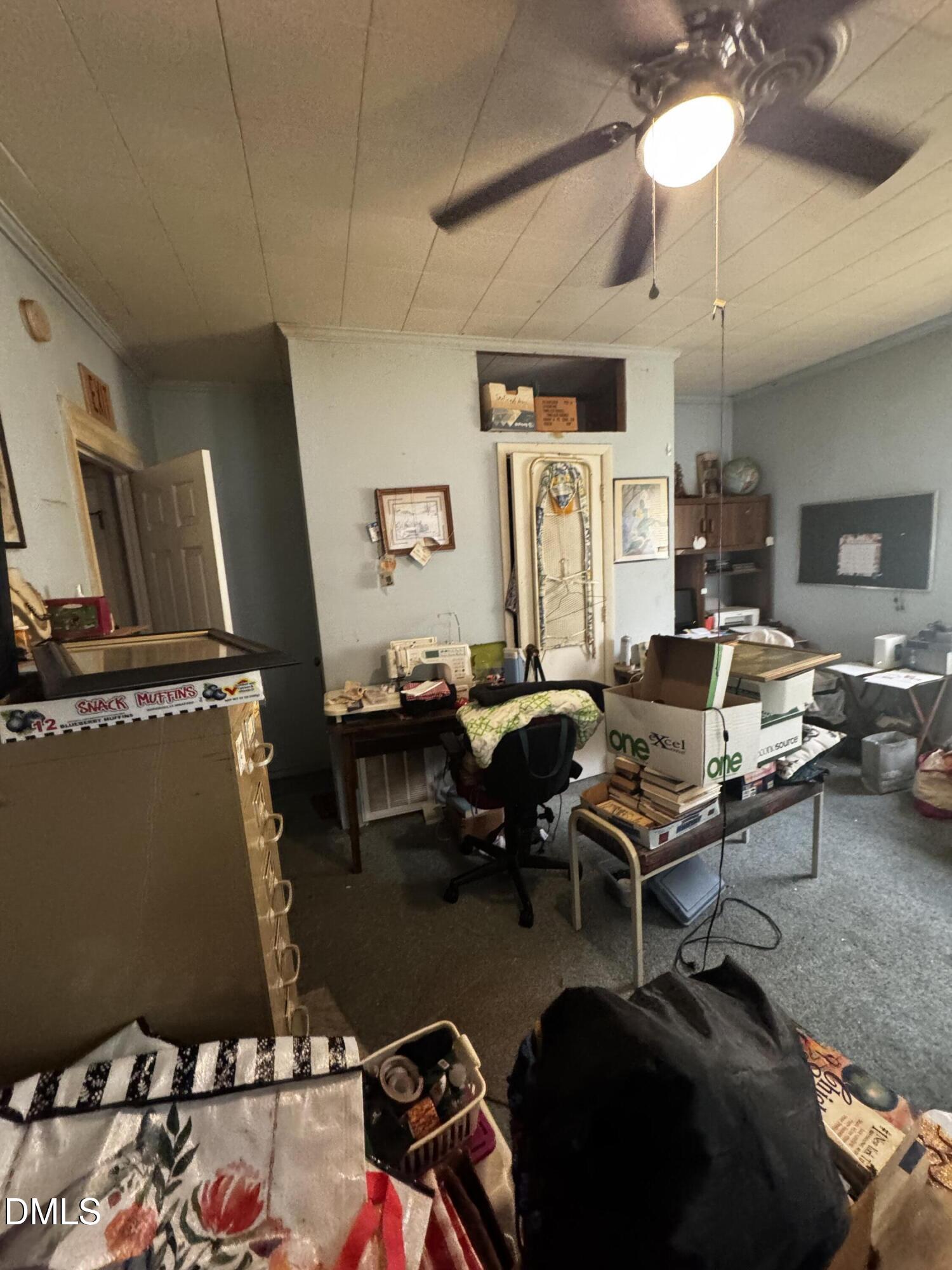 4229 Old Faison Road Knightdale, NC 27545 - Photo 9 of 16 a living room with furniture and a flat screen tv