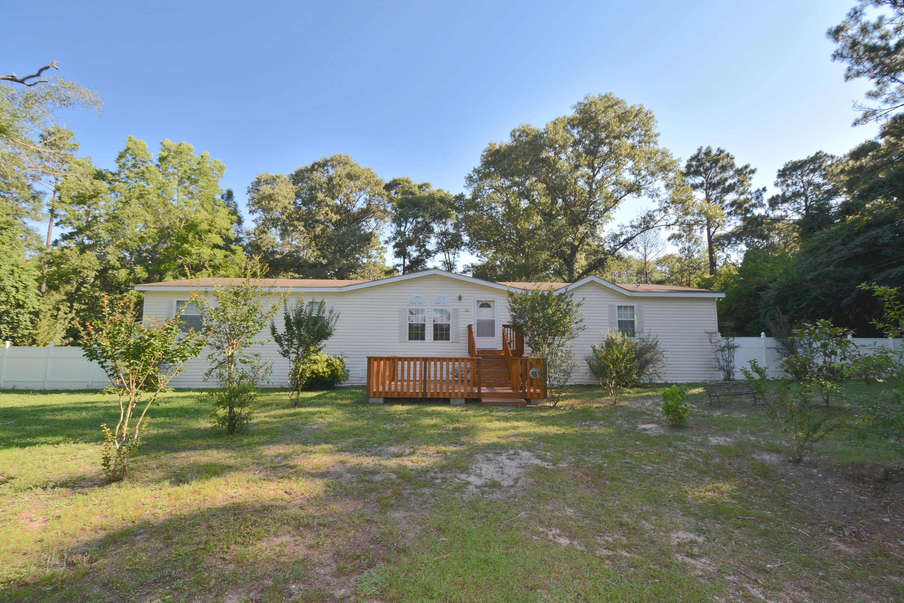 2953 Adams Road Crestview, FL 32536 - Photo 1 of 51 front view of a house with a yard