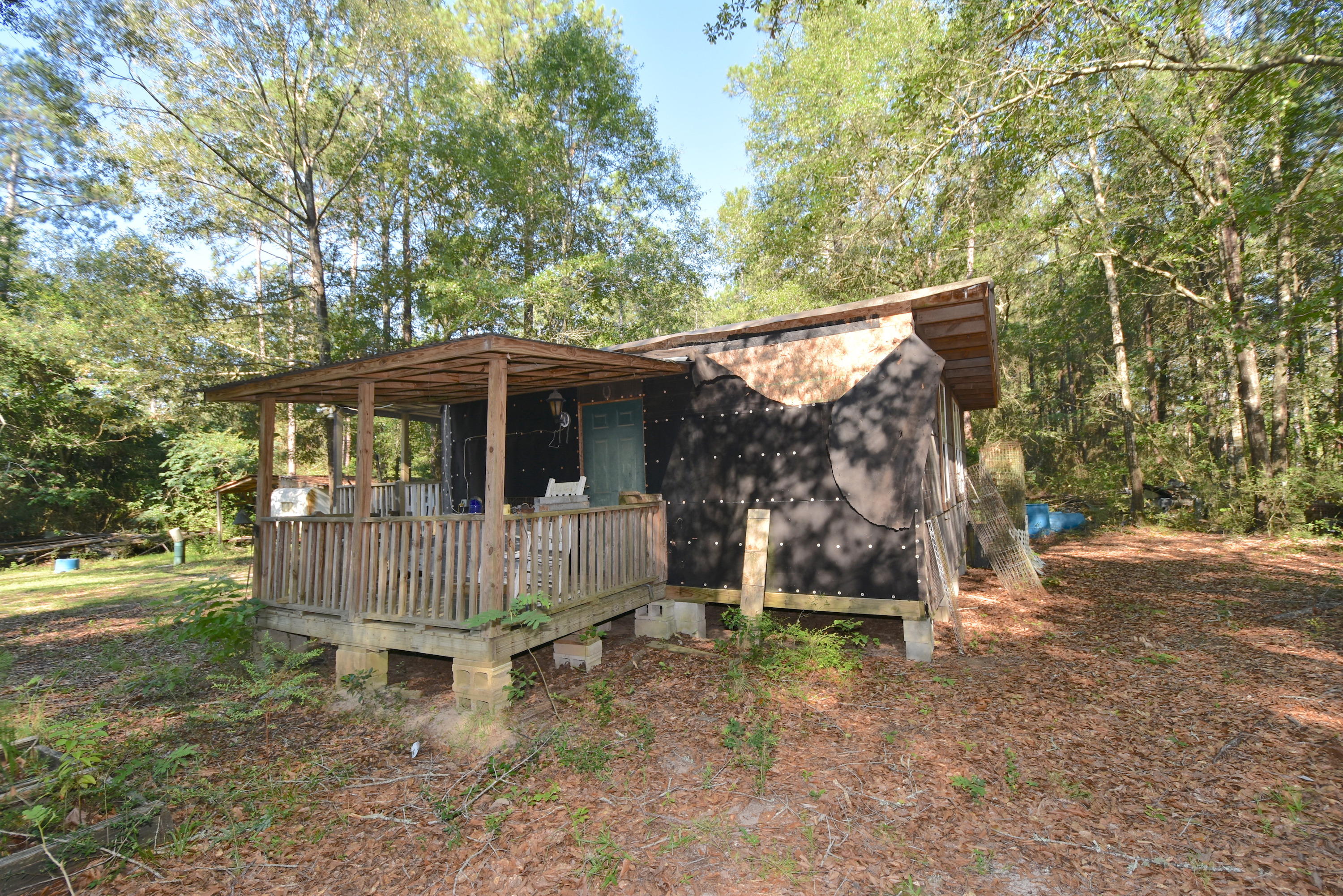 2953 Adams Road Crestview, FL 32536 - Photo 41 of 51 a view of a house with a yard
