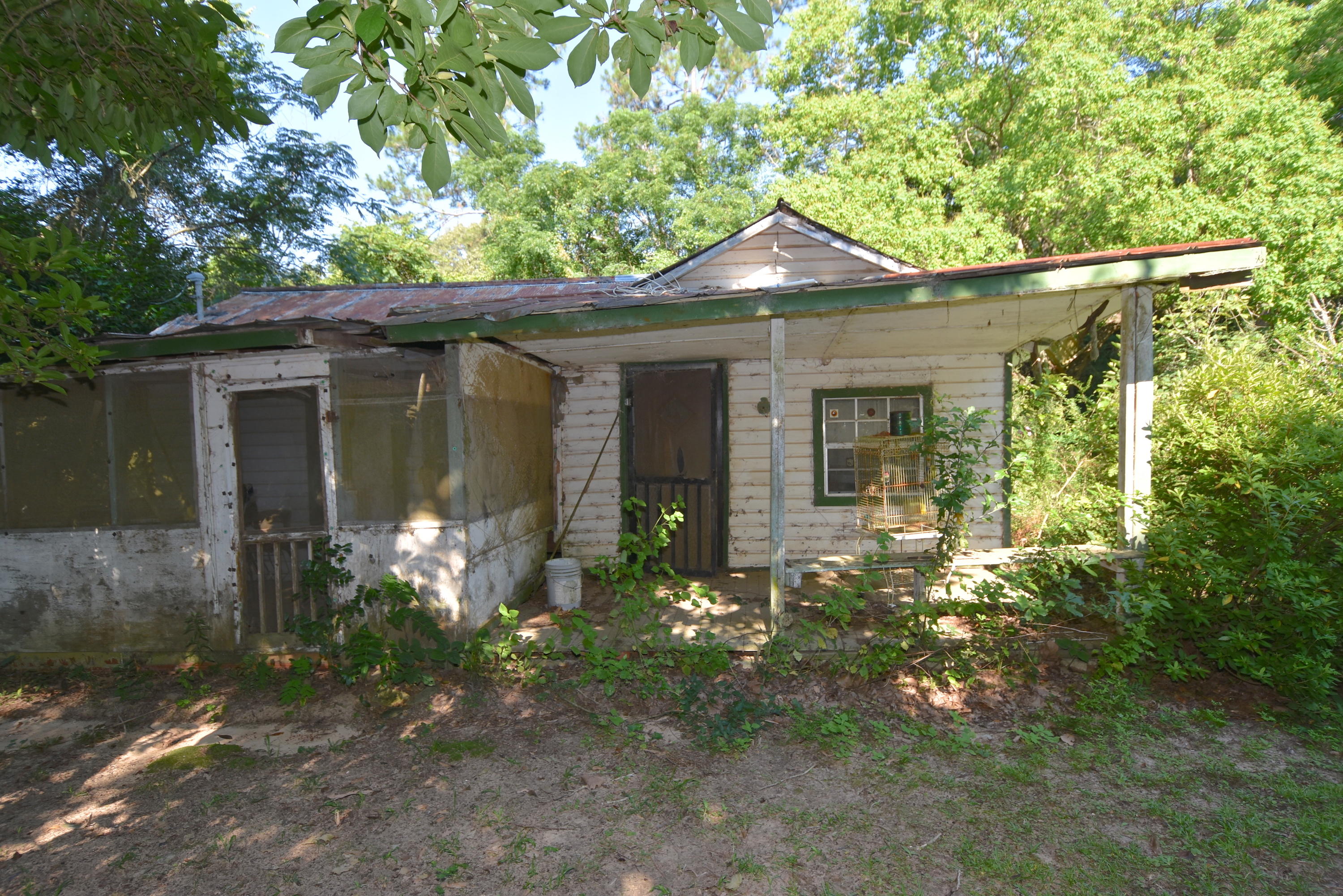 2953 Adams Road Crestview, FL 32536 - Photo 49 of 51 a front view of a house with garden
