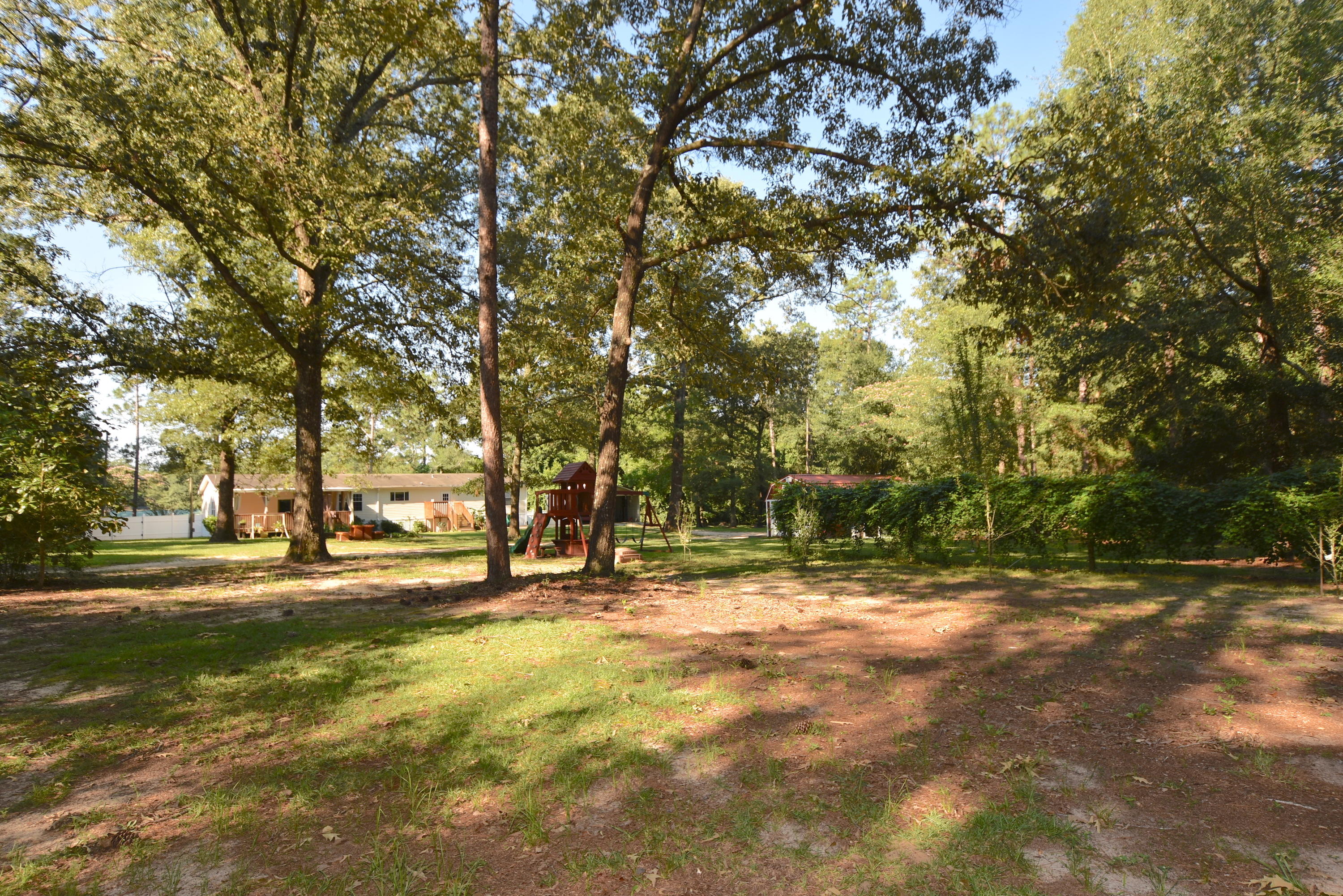 2953 Adams Road Crestview, FL 32536 - Photo 50 of 51 a view of road with trees