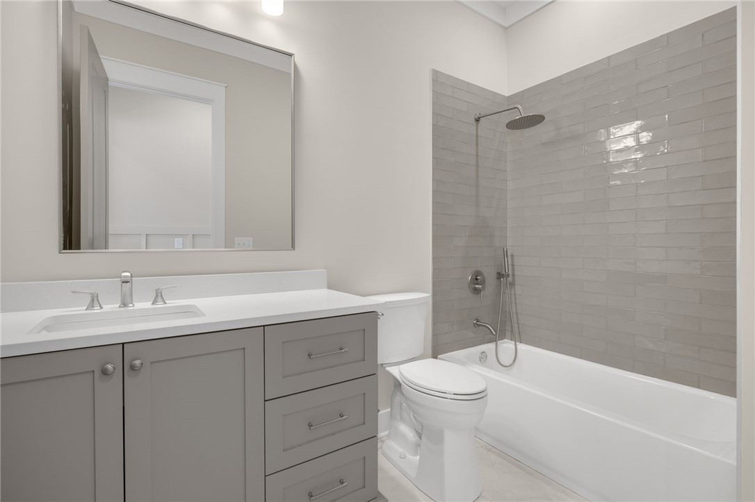 384 Jim Smith Road Pendleton, SC 29670 - Photo 24 of 48 Clean lines and modern tile work define this updated bathroom space.