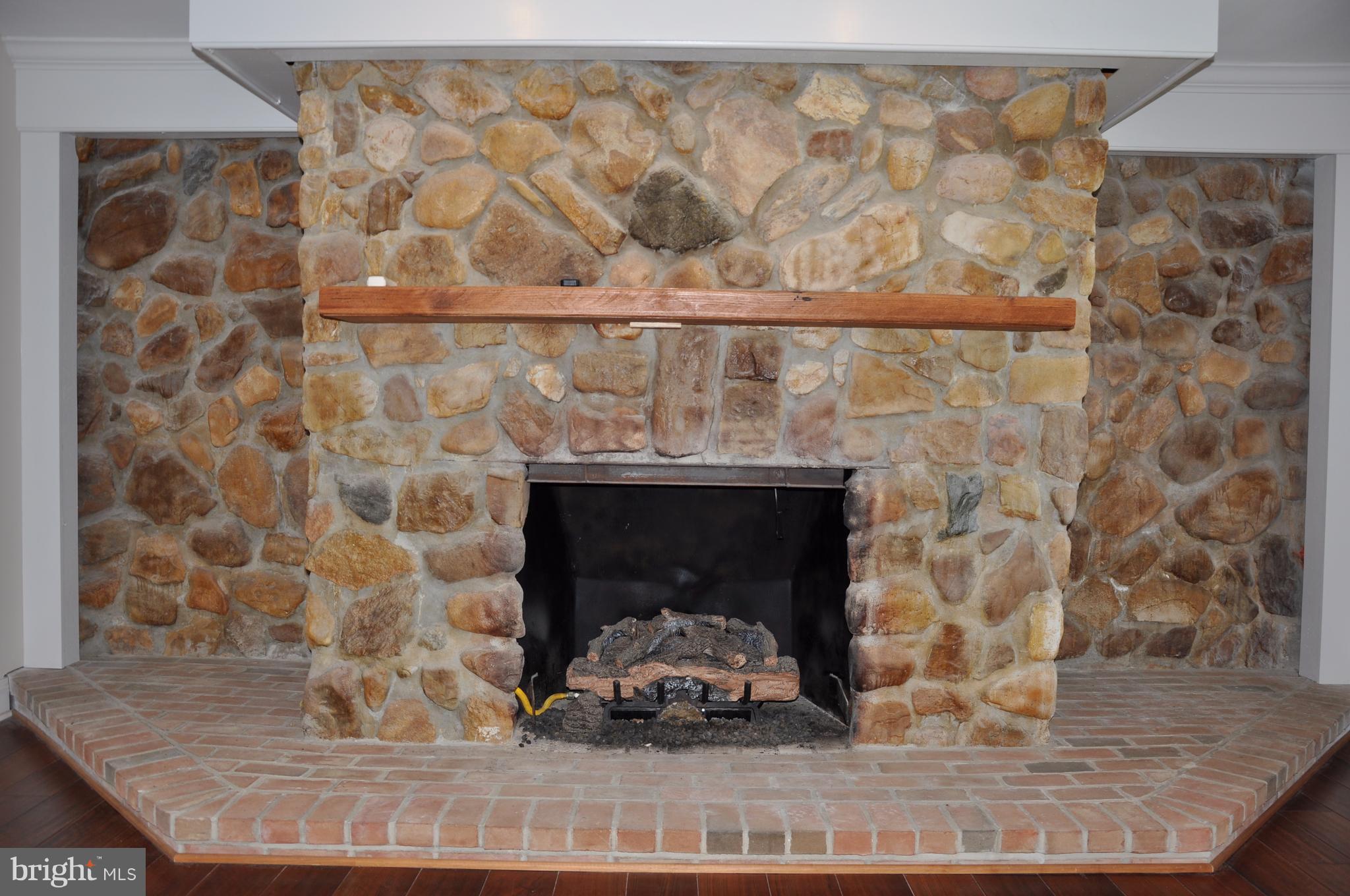 1333 Stone Boundary Road Cambridge, MD 21613 - Photo 4 of 30 Stone Gas Fireplace