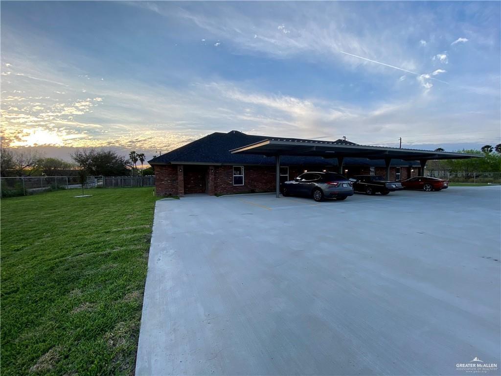 5206 Murillo Street, Unit 3 Edinburg, TX 78542 - Photo 9 of 9 a view of a car park in front of house