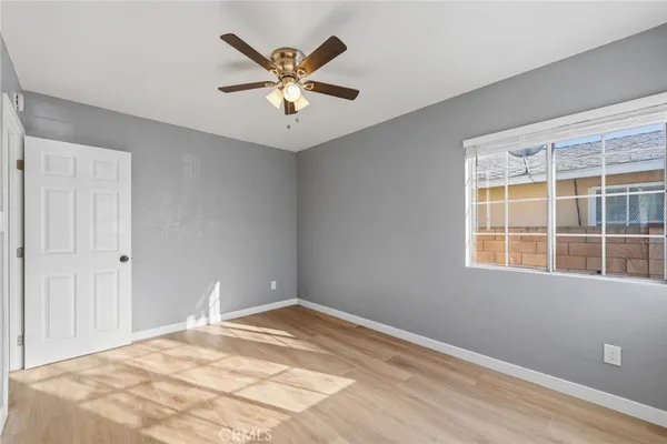 a view of a bedroom with a window