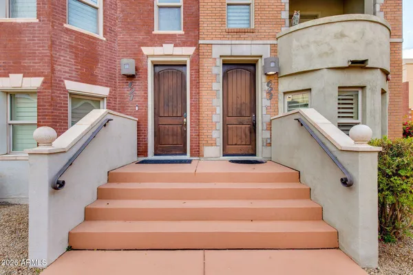 a view of stairs and with windows