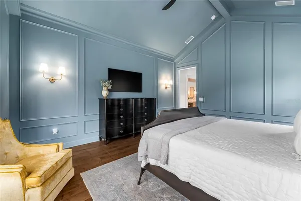 a bathroom with a double vanity sink mirror and bathtub