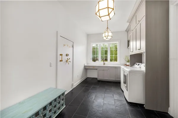 a bathroom with a sink and mirror