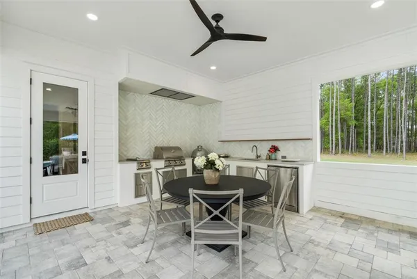 a view of a swimming pool with a yard