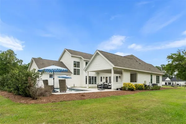 an aerial view of a house with a garden